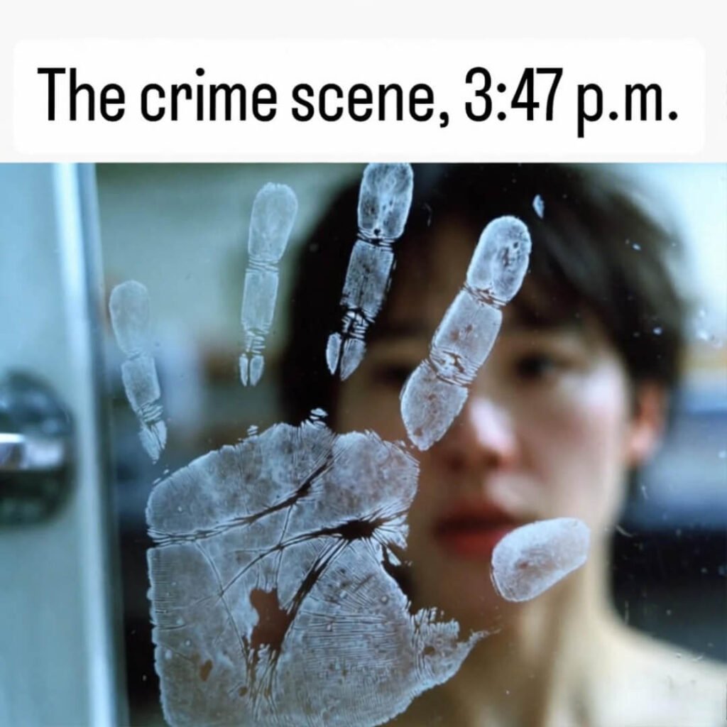 Sticky handprint on fridge, exhausted mom reflected.